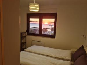 Appartments Akrapovic客房内的一张或多张床位