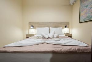 Posteľ alebo postele v izbe v ubytovaní Mavros Molos Seaside Apartment