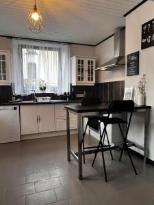 Kuchyň nebo kuchyňský kout v ubytování Le Clos fleuri