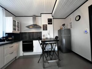 Kuchyň nebo kuchyňský kout v ubytování Le Clos fleuri