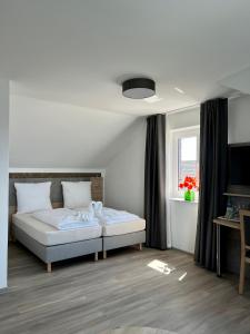 Postel nebo postele na pokoji v ubytování Hotel Ocean