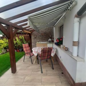 A balcony or terrace at Rózsa Vendégház