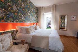 Postel nebo postele na pokoji v ubytování Château De Siran - Hôtel & Spa