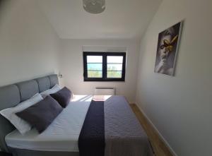 Appartments Akrapovic客房内的一张或多张床位