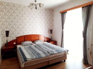 Posteľ alebo postele v izbe v ubytovaní Central Room