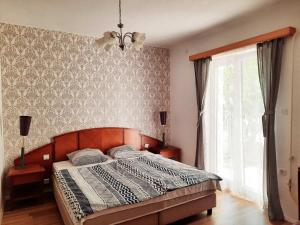 Posteľ alebo postele v izbe v ubytovaní Central Room