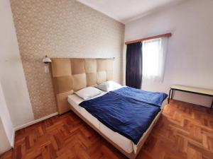 Posteľ alebo postele v izbe v ubytovaní Central Room