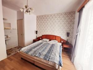 Posteľ alebo postele v izbe v ubytovaní Central Room