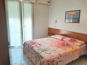 Posteľ alebo postele v izbe v ubytovaní Hotel Amalfi