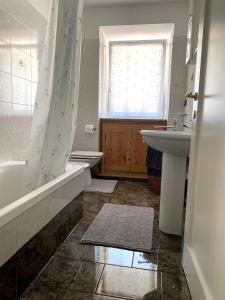 A bathroom at Laghetto delle Buse Home