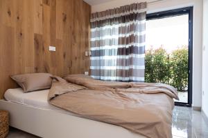 Postel nebo postele na pokoji v ubytování Coco de Luxe Apartment