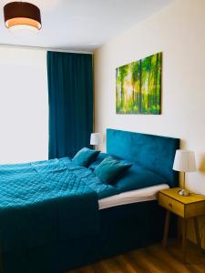 Posteľ alebo postele v izbe v ubytovaní apartmán MONYA