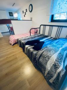 Postel nebo postele na pokoji v ubytování Apartma KAMNITNK