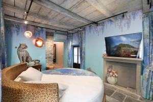 Postel nebo postele na pokoji v ubytování Suites&Atelier Lake Como