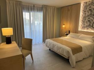 Postel nebo postele na pokoji v ubytování Hotel Noy