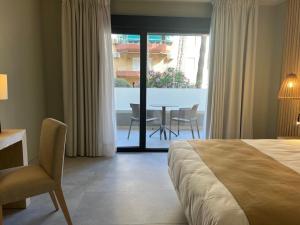 Postel nebo postele na pokoji v ubytování Hotel Noy