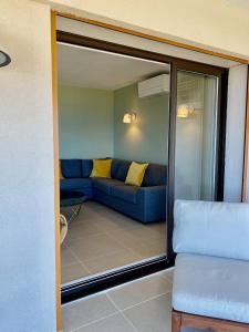 Posedenie v ubytovaní Mimosas - Bel appartement avec une vue imprenable sur la baie