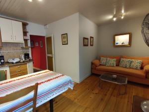 a living room with a couch and a table at bayonne centre in Bayonne