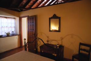 A bed or beds in a room at Casa Bana I