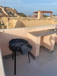 Balkon lub taras w obiekcie Precioso ático con vistas al mar y la montaña
