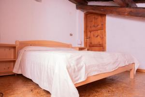 Posteľ alebo postele v izbe v ubytovaní Casa vacanze La Maddalena