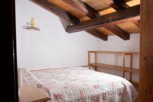 Posteľ alebo postele v izbe v ubytovaní Casa vacanze La Maddalena