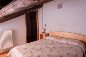 Posteľ alebo postele v izbe v ubytovaní Casa vacanze La Maddalena