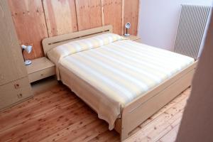 Posteľ alebo postele v izbe v ubytovaní Casa vacanze La Maddalena