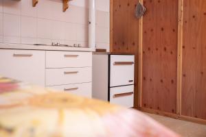 Kuchyňa alebo kuchynka v ubytovaní Casa vacanze La Maddalena