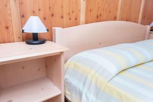 Posteľ alebo postele v izbe v ubytovaní Casa vacanze La Maddalena