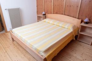 Posteľ alebo postele v izbe v ubytovaní Casa vacanze La Maddalena