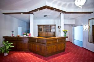 a large courtroom with a wooden altar in a building at Parkhotel Wörlitz in Oranienbaum-Wörlitz