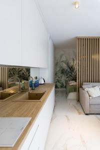 Posedenie v ubytovaní Apartament Klifowa 8 lok 4 w budynku basen sauna