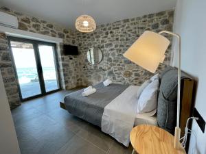 Postel nebo postele na pokoji v ubytování Ocean Bliss Villa, By Hellocrete