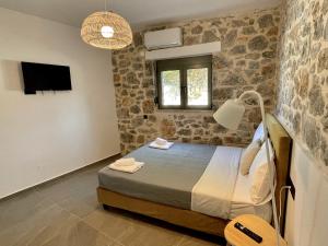 Postel nebo postele na pokoji v ubytování Ocean Bliss Villa, By Hellocrete