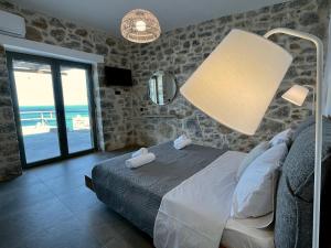 Postel nebo postele na pokoji v ubytování Ocean Bliss Villa, By Hellocrete