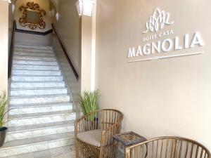 Um certificado, prêmio, placa ou outro documento exibido em Magnolia Inn