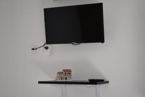 TV a/nebo společenská místnost v ubytování Twin Love Apartment