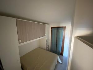 מיטה או מיטות בחדר ב-Residence Il Sogno