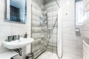 Koupelna v ubytování Family Apartments Klínovec + 37 fotografií