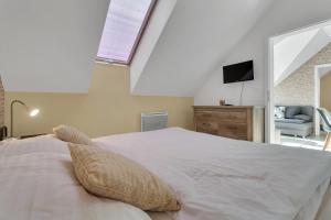 Postel nebo postele na pokoji v ubytování Family Apartments Klínovec