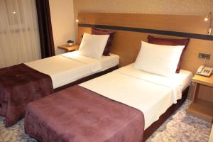 Postel nebo postele na pokoji v ubytování Hotel Osaka Airport