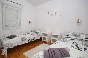 Postel nebo postele na pokoji v ubytování TK apartments