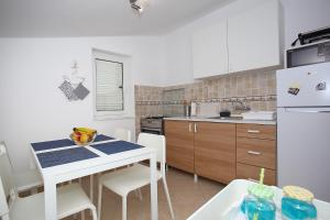 Kuchyň nebo kuchyňský kout v ubytování TK apartments