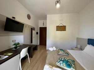 Posteľ alebo postele v izbe v ubytovaní Bellavista Rooms