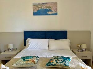 Posteľ alebo postele v izbe v ubytovaní Bellavista Rooms