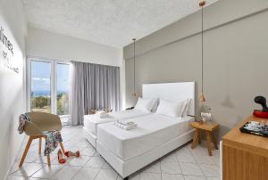 Posteľ alebo postele v izbe v ubytovaní Vasia Royal Hotel
