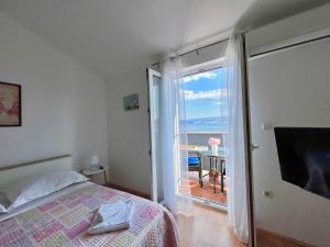 Postel nebo postele na pokoji v ubytování Apartments Rudi