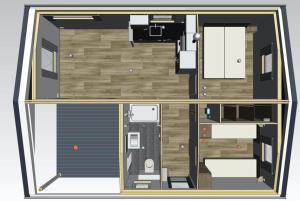 a floor plan of a small house with a room at Ferienhaus Auszeit an der Mosel in Koblenz in Koblenz