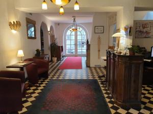 Posezení v ubytování Hotel Altes Pfarrhaus Beaumarais